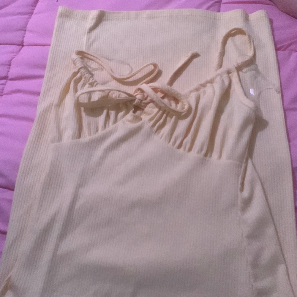 yellow medium sized dress,never been worn,washed aswell